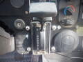 A gear shift lever labeled with P R N D 3 2 1 on a dashboard of a 2008 Freightliner MT45 Chassis