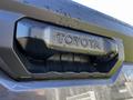 Close-up of the rear handle with the embossed Toyota logo on a 2023 Toyota Tundra