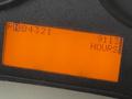 The dashboard display of a 2016 International 7400 showing an orange digital readout with the text RD 4321 and 9113 HOURS