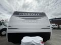 2022 Keystone Hideout RDWE 20RDWE travel trailer featuring a sleek exterior design with the word "HIDEOUT" prominently displayed across the front