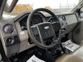 Interior view of a 2008 Ford F-450 SD showing the steering wheel dashboard and control panel