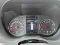 Dashboard of a 2025 Mercedes-Benz Sprinter showing speedometer and tachometer alongside a digital display of vehicle information