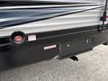 2021 Jayco Jay Flight travel trailer with a rear black panel and a round red access point for fuel marked unleaded fuel only