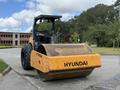 A 2020 Hyundai HR110C road roller with a large front drum and rugged rear wheels, designed for compacting surfaces in construction projects