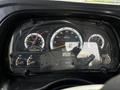 Dashboard of a 2012 Autocar Xpert showing speedometer fuel gauge and various indicators with readings in miles per hour and mileage at 93232