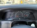 Dashboard of a 2008 Ford F-750 showing speedometer fuel gauge and various other dials