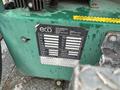 A green equipment label on a trailer featuring specifications and warnings related to the 2011 Hightliner Aquacide Hot Water Weed Control system