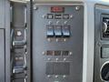 Control panel of a 1994 Volvo FE 42 featuring various switches and buttons for operational functions