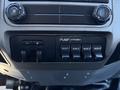 Dashboard controls of a 2016 Ford F-550 featuring switches for pump and strobe lights with labels AUX 1 to AUX 4