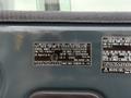 A 2022 Hyundai R55-9A engine information label displaying model details and regulatory compliance information