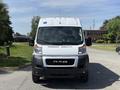 A 2021 RAM Promaster van with a white exterior and black front grille facing the viewer
