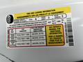 2010 Ford F-150 tire and loading information sticker displaying seating capacity and tire pressure recommendations