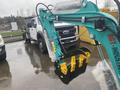A 2024 AGT Industrial MH12R Mini Excavator with a teal arm and a black and yellow bucket ready for use
