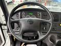 Steering wheel and dashboard of a 2016 Freightliner 108SD featuring gauges switches and a display screen