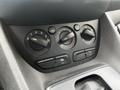 Climate control knobs and buttons for the air conditioning system in a 2016 Ford Transit Connect