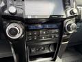 The dashboard of a 2021 Toyota 4Runner featuring temperature controls and a display panel showing climate settings