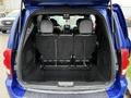Interior of a 2020 Dodge Grand Caravan showing the back seats in a folded position with a spacious cargo area