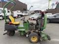 A 2009 John Deere 2653B Precision turf maintenance machine with a yellow seat and green body featuring multiple cutting blades and an open console design