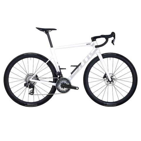 A 2026 BMC Teammachine SLR 01 THREE carbon performance race road bike featuring a sleek white frame and disc brakes with black wheels and components