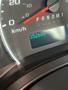 A close-up view of the speedometer in a 2019 Chevrolet Express displaying a mileage reading of 352606 km/h