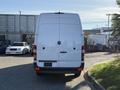 A white 2016 Mercedes-Benz Sprinter van facing backward with no visible markings or logos