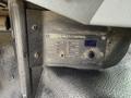 A control panel labeled Digital Multi Control with various indicator lights and a knob for adjusting settings