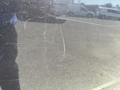 A 2016 Chevrolet Tahoe with visible scratches on its surface