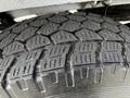 Close-up of a tire from a 2017 Mercedes-Benz Sprinter showing tread patterns designed for grip and traction