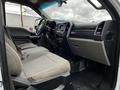 Interior view of a 2017 Ford F-550 showing front seats dashboard and console features