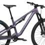 A 2025 Canyon Neuron CF 7 mountain bike features a sleek purple frame with a prominent suspension system and sturdy tires designed for rugged terrains
