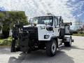 A 2016 Freightliner 108SD truck with a front-mounted plow and utility bed designed for heavy-duty work