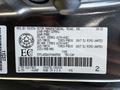 2023 Toyota Tundra with a vehicle identification label displaying manufacturing details and specifications