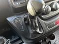 The image shows the gear shift console of a 2017 RAM Promaster with the gear selection lever and control buttons for tow haul and drive settings