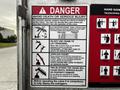 2016 Ford F-550 with a crane attached displaying safety warnings and instructions for operation