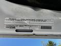 A 2016 RAM 2500 vehicle emission control information label detailing specifications and compliance information