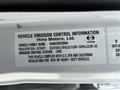 Label detailing vehicle emission control information for a 2020 Hino 338 including vehicle family name and regulatory sub-category
