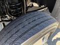 Close-up view of a tire from a 2023 Ford F-550 showing the tread pattern and sidewall detail