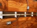 2007 GMC W3500 featuring a wooden interior wall with metal strips and electrical outlets