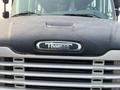 Front view of a 2007 Freightliner B2 with a silver grille and the logo reading Thomas on the hood