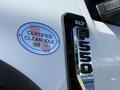 2023 Ford F-550 badge displaying XLT and Certified Clean Idle sticker on the vehicle's exterior