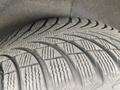 Close-up of a tire tread on a 2009 BMW X5 showing detailed patterns and grooves designed for traction and stability
