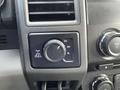 Close-up of the control panel in a 2017 Ford F-250 SD featuring the drive mode selector knob and related buttons for four-wheel drive settings