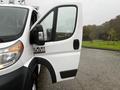 A white 2018 RAM Promaster van with its front driver's side door open