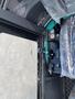 2024 AGT Industrial Green QH13R Mini Excavator control panel featuring various levers switches and gauges