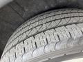 Close-up of a tire from a 2015 Dodge Durango showing tread pattern and rubber texture