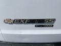 Close-up of the Chevrolet Express badge featuring the word Express in bold black letters with a silver outline and the word Stabilitrak in smaller letters below