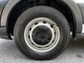 Close-up of a 2015 Ford Transit wheel featuring a Kumho tire and a five-spoke steel rim