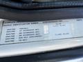 2005 Volvo VND 122 vehicle identification number label displaying weight specifications and axle information