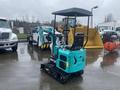 2024 AGT Industrial MH12R Mini Excavator in teal color with a black seat and canopy designed for compact construction projects