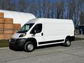 A 2019 RAM Promaster cargo van in white with black accents parked on a paved surface